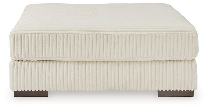 Lindyn 2-Piece Sectional, Chaise and Oversized Ottoman from Ashley - Lara Furniture