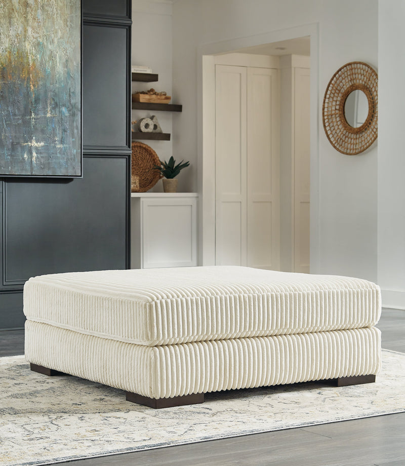 Lindyn 2-Piece Sectional, Chaise and Oversized Ottoman from Ashley - Lara Furniture