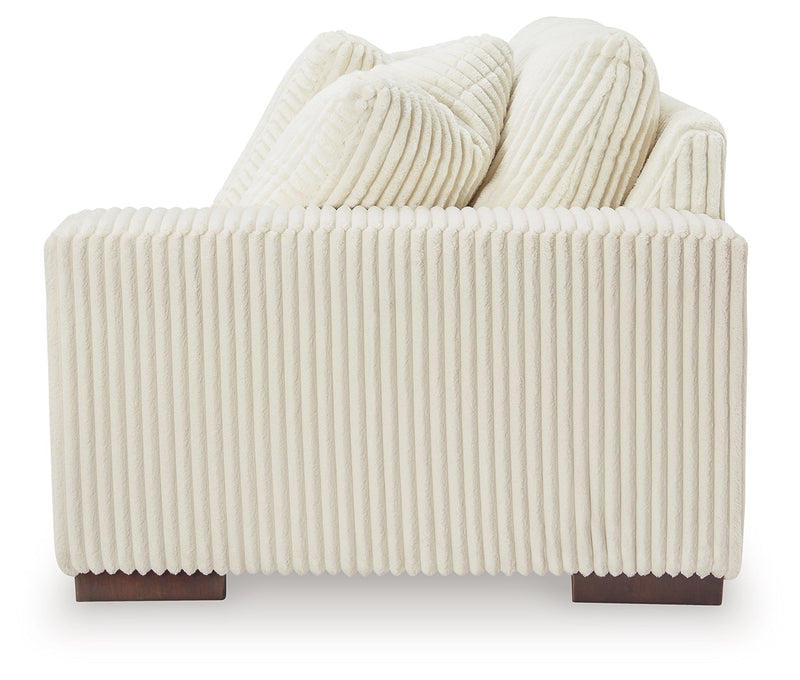Lindyn 2-Piece Sectional, Chaise and Oversized Ottoman from Ashley - Lara Furniture