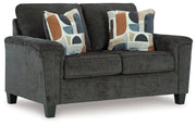 Erinslane Sofa, Loveseat, Chair and Ottoman from Ashley - Lara Furniture