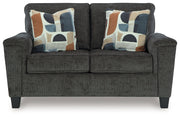 Erinslane Sofa, Loveseat, Chair and Ottoman from Ashley - Lara Furniture