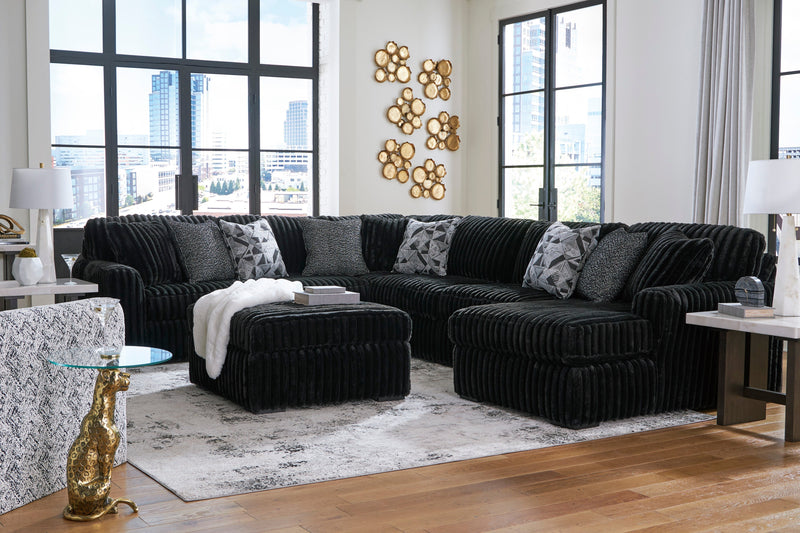 Midnight-Madness 4-Piece Sectional with Ottoman in Onyx from Ashley - Lara Furniture