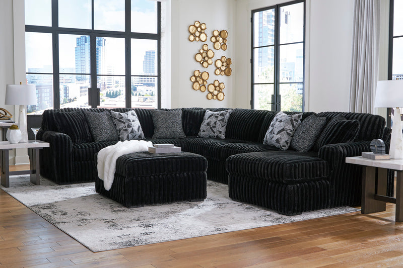 Midnight-Madness 4-Piece Sectional with Ottoman in Onyx from Ashley - Lara Furniture
