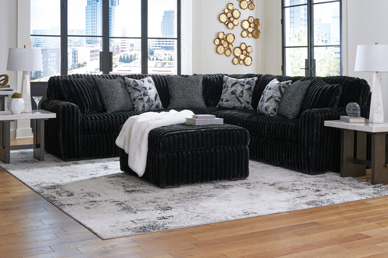 Midnight-Madness 3-Piece Sectional with Ottoman in Onyx from Ashley - Lara Furniture