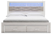 Altyra White King Upholstered Bookcase Bed with Storage from Ashley - Lara Furniture