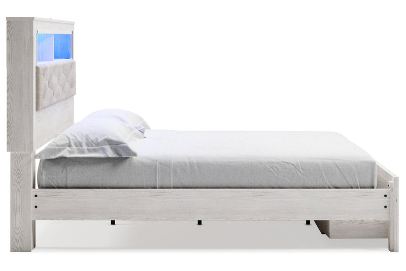 Altyra White King Upholstered Bookcase Bed with Storage from Ashley - Lara Furniture