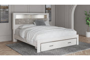Altyra White King Upholstered Bookcase Bed with Storage from Ashley - Lara Furniture