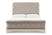 Realyn Chipped White California King Sleigh Bed from Ashley - Lara Furniture