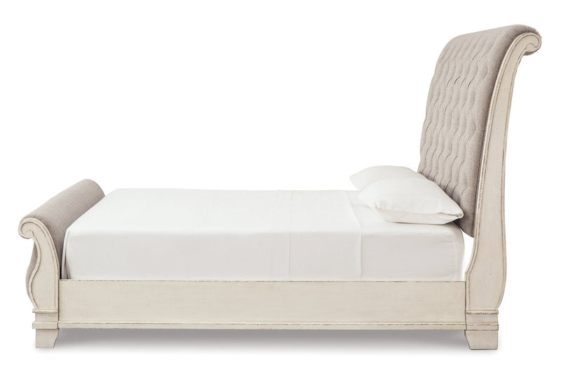 Realyn Chipped White California King Sleigh Bed from Ashley - Lara Furniture