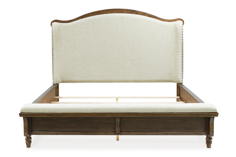 Sturlayne Brown California King Upholstered Panel Bed from Ashley - Lara Furniture