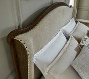 Sturlayne Brown California King Upholstered Panel Bed from Ashley - Lara Furniture