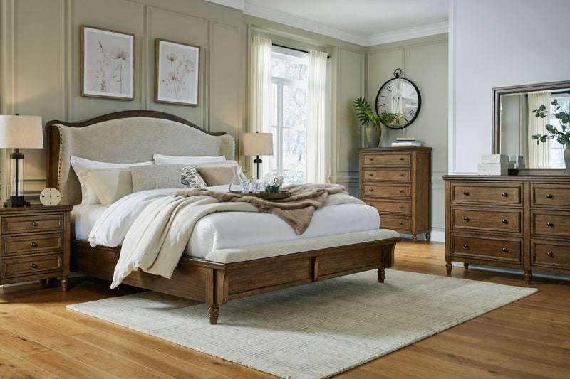 Sturlayne Brown California King Upholstered Panel Bed from Ashley - Lara Furniture