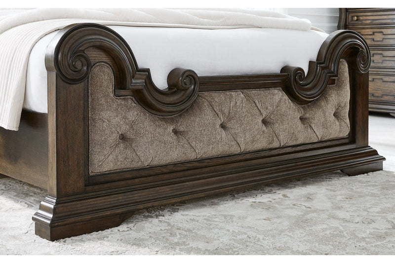 Maylee Dark Brown California King Upholstered Bed from Ashley - Lara Furniture