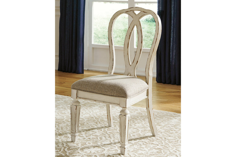 Realyn Chipped White Oval Dining Table and 4 Ribbon Back Chairs from Ashley - Lara Furniture