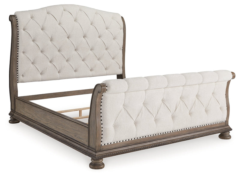 Ardenfield California King Upholstered Sleigh Bed with Dresser and 2 Nightstands in Light Brown from Ashley - Lara Furniture