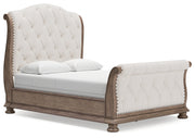 Ardenfield Queen Upholstered Sleigh Bed with Mirrored Dresser and Nightstand in Light Brown from Ashley - Lara Furniture