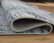 Arlenmont Blue/White/Brown 7'6" X 9'6" Memory Foam Area Rug - R407481