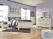 Bellaby King Crossbuck Panel Bed with Mirrored Dresser, Chest and 2 Nightstands in Whitewash from Ashley - Lara Furniture