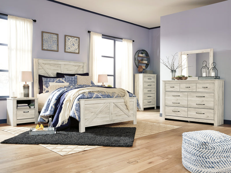 Bellaby Queen Crossbuck Panel Bed with Mirrored Dresser, Chest and Nightstand in Whitewash from Ashley - Lara Furniture