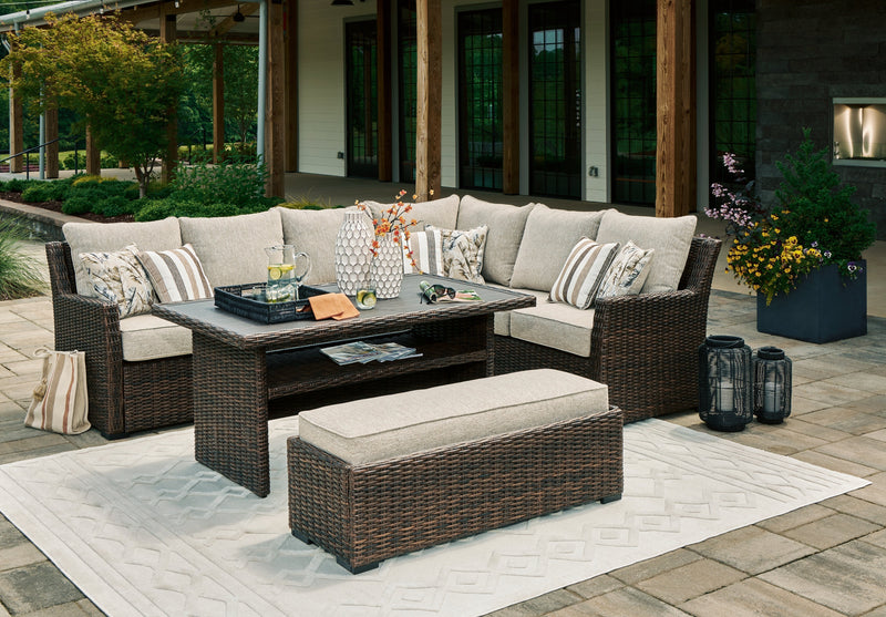 Brook Ranch Outdoor Sectional Set with Coffee Table in Brown from Ashley - Lara Furniture