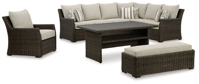 Brook Ranch Outdoor Sectional Set with Lounge Chair and Coffee Table in Brown from Ashley - Lara Furniture