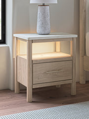 Cadmori Queen Upholstered Panel Bed with Mirrored Dresser and Chest in Two-tone from Ashley - Lara Furniture