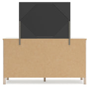 Cadmori Queen Upholstered Panel Bed with Mirrored Dresser, Chest and Nightstand in Two-tone from Ashley - Lara Furniture