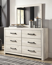 Cambeck Full Panel Bed with 4 Storage Drawers with Mirrored Dresser in Whitewash - PKG003056