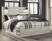 Cambeck King Panel Bed with 2 Storage Drawers with Mirrored Dresser, Chest and Nightstand in Whitewash - PKG003004