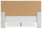 Cayboni King Panel Bed with 2 Nightstands in Whitewash from Ashley - Lara Furniture