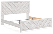 Cayboni King Panel Bed with Mirrored Dresser, Chest and Nightstand in Whitewash from Ashley - Lara Furniture