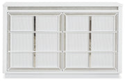 Chalanna King Upholstered Storage Bed with Dresser and Nightstand in White from Ashley - Lara Furniture