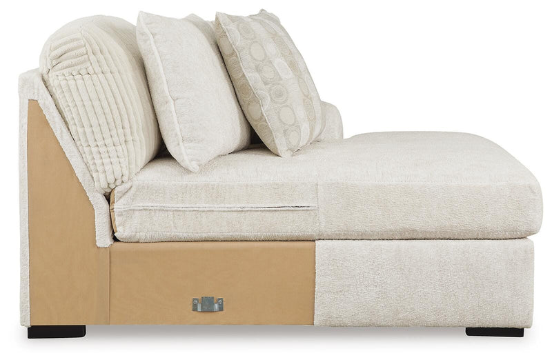 Chessington Ivory 4-Piece Sectional and Oversized Accent Ottoman - 61904U1