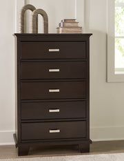 Covetown King Panel Bed with Mirrored Dresser and Chest in Dark Brown from Ashley - Lara Furniture