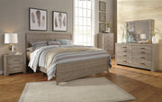 Culverbach King Panel Bed with Mirrored Dresser, Chest and Nightstand in Gray - PKG011531