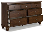 Danabrin Queen Panel Storage Bed, Dresser and Nightstand in Brown - PKG023940