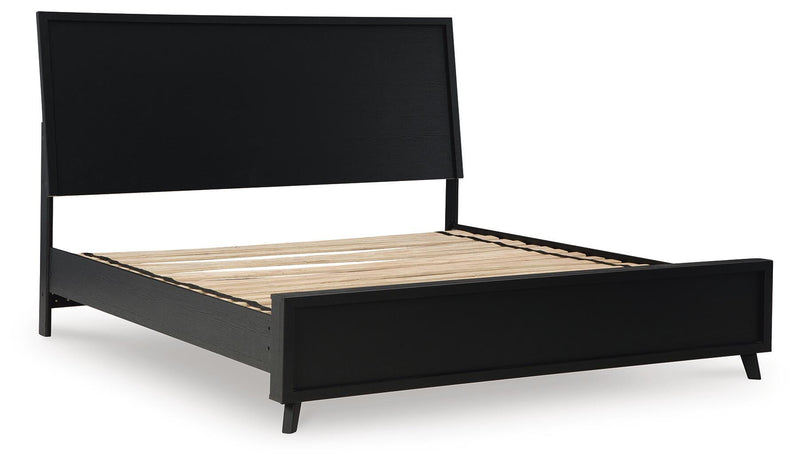 Danziar King Panel Bed, Dresser, Mirror and Chest in Black - PKG015917