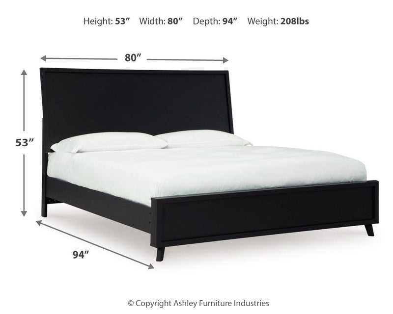 Danziar King Panel Bed, Dresser, Mirror, Chest and Nightstand in Black - PKG015918