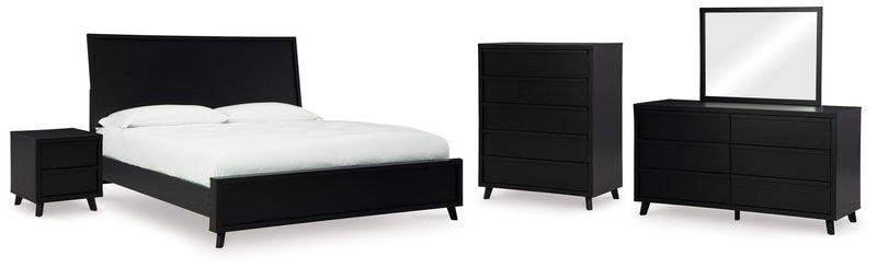 Danziar King Panel Bed, Dresser, Mirror, Chest and Nightstand in Black - PKG015918