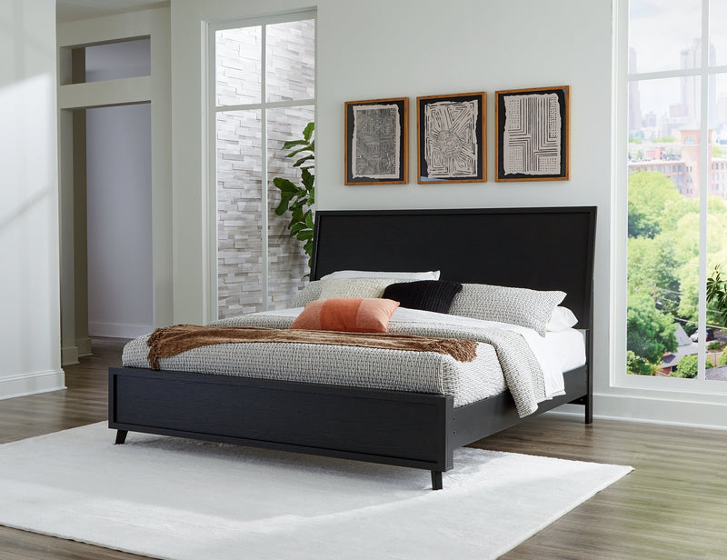 Danziar King Panel Bed with Mirrored Dresser, Chest and 2 Nightstands in Black - PKG015915