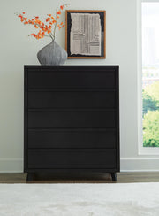 Danziar King Panel Headboard, Dresser, Mirror, Chest and Nightstand in Black - PKG016026