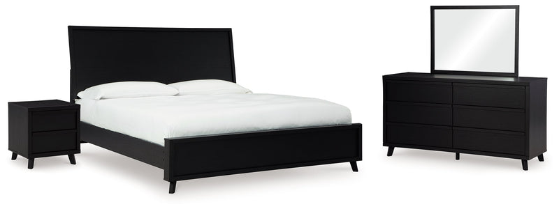 Danziar Queen Panel Bed with Mirrored Dresser and Nightstand in Black - PKG015892