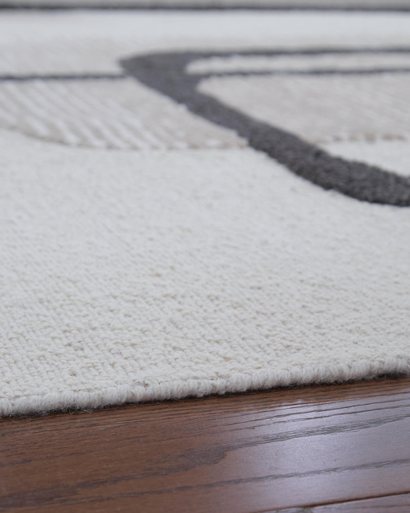 Davismour Ivory/Taupe/Charcoal 7'8" x 10' Area Rug - R407561