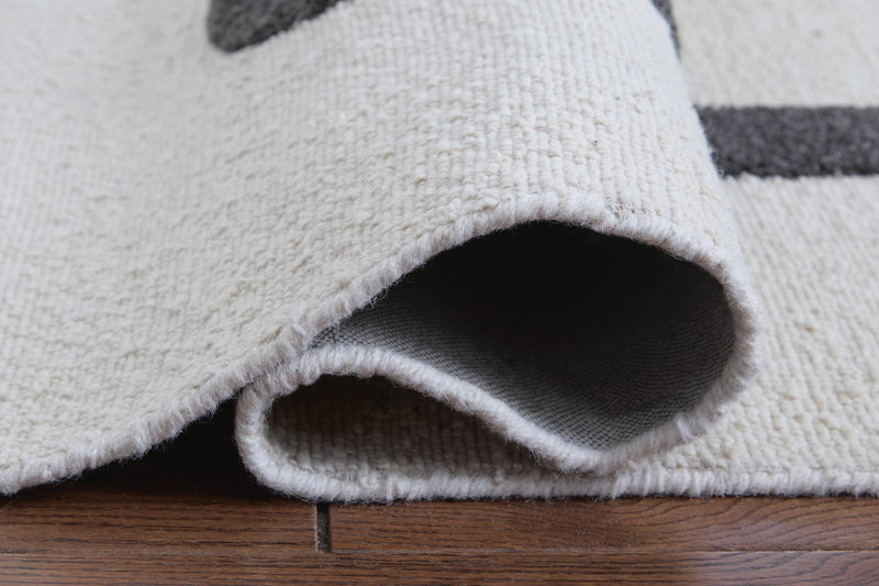 Davismour Ivory/Taupe/Charcoal 7'8" x 10' Area Rug - R407561