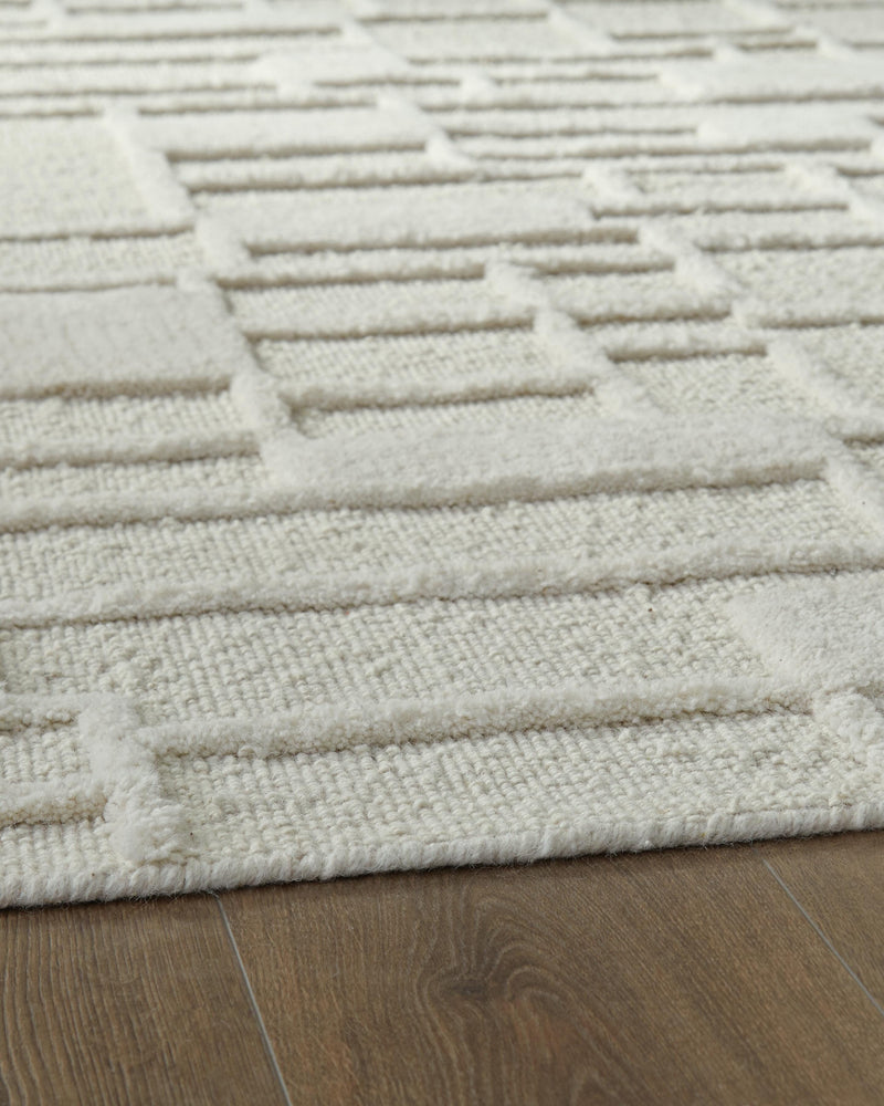 Empriss Ivory 5' x 7' Area Rug - R407622