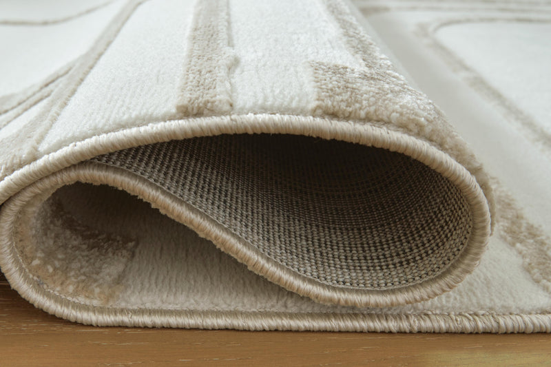 Farongrove Ivory/Beige 7'10" x 10' Area Rug - R407671