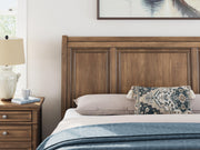 Feddinger California King Storage Sleigh Bed with Mirrored Dresser in Medium Brown - PKG022340