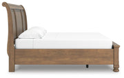 Feddinger King Storage Sleigh Bed with Mirrored Dresser, Chest and 2 Nightstands in Medium Brown - PKG022334