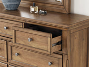 Feddinger Queen Sleigh Storage Bed, Dresser and Mirror - PCB779B5