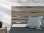 Graystorm Queen Panel Bed, Dresser, Mirror and Nightstand in Brown Gray - PKG021350
